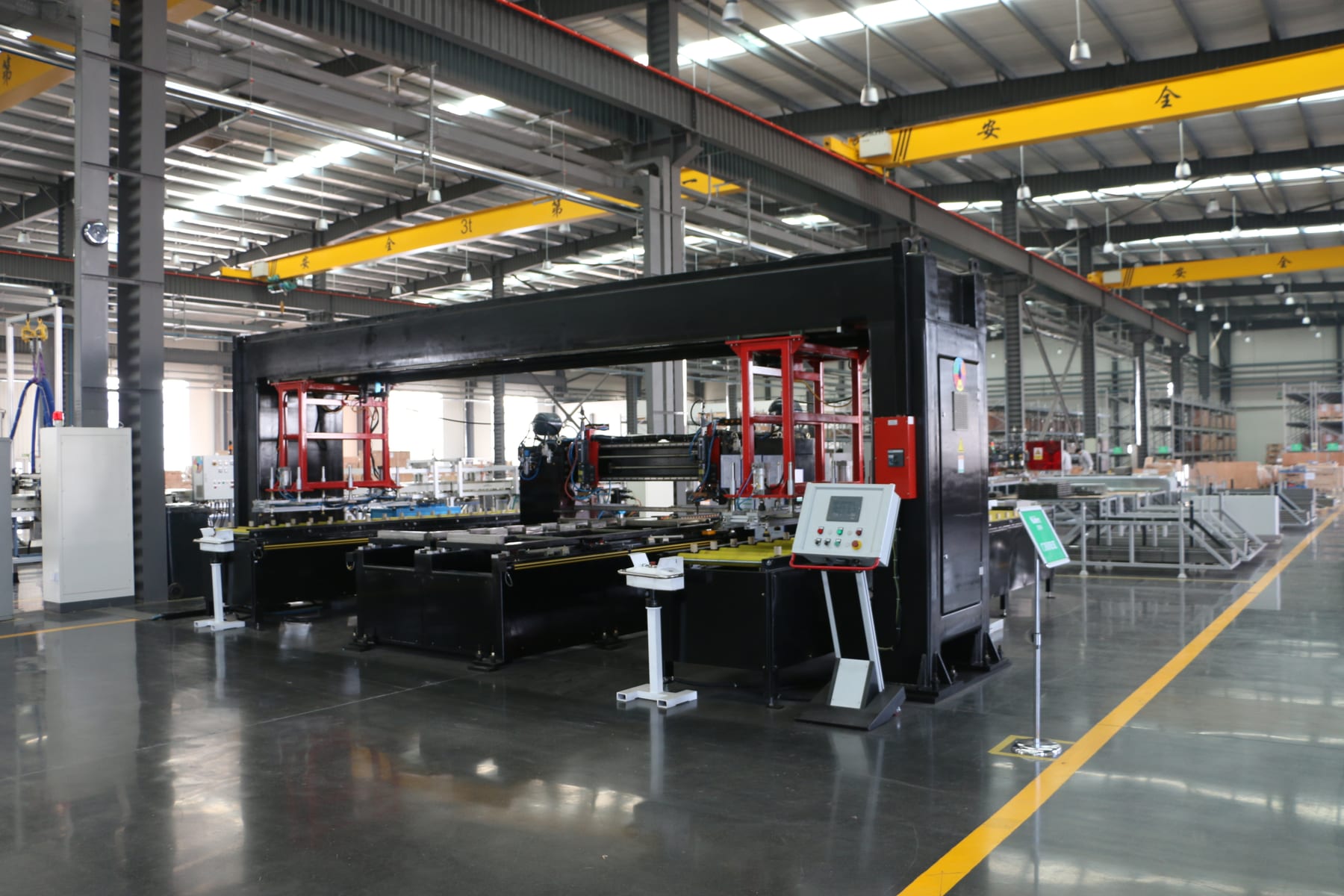 Automated fabrication equipment inside the Nidec elevator factory